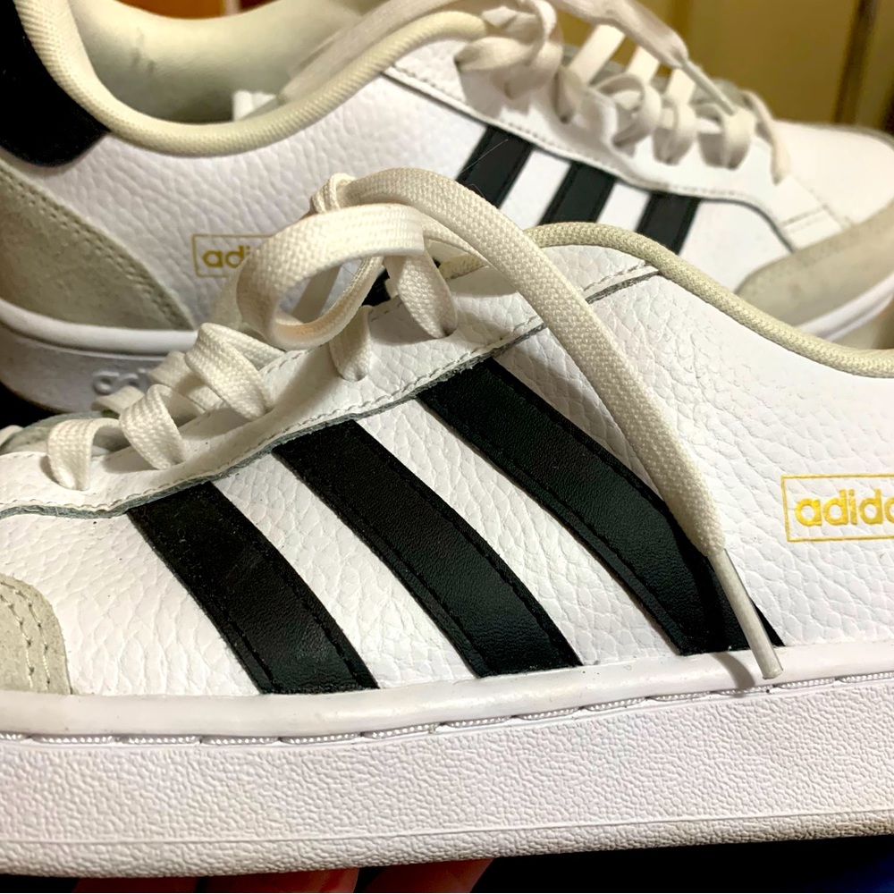 Very gently worn  adidas cloud foam comfort sneakers. white with black stripes.